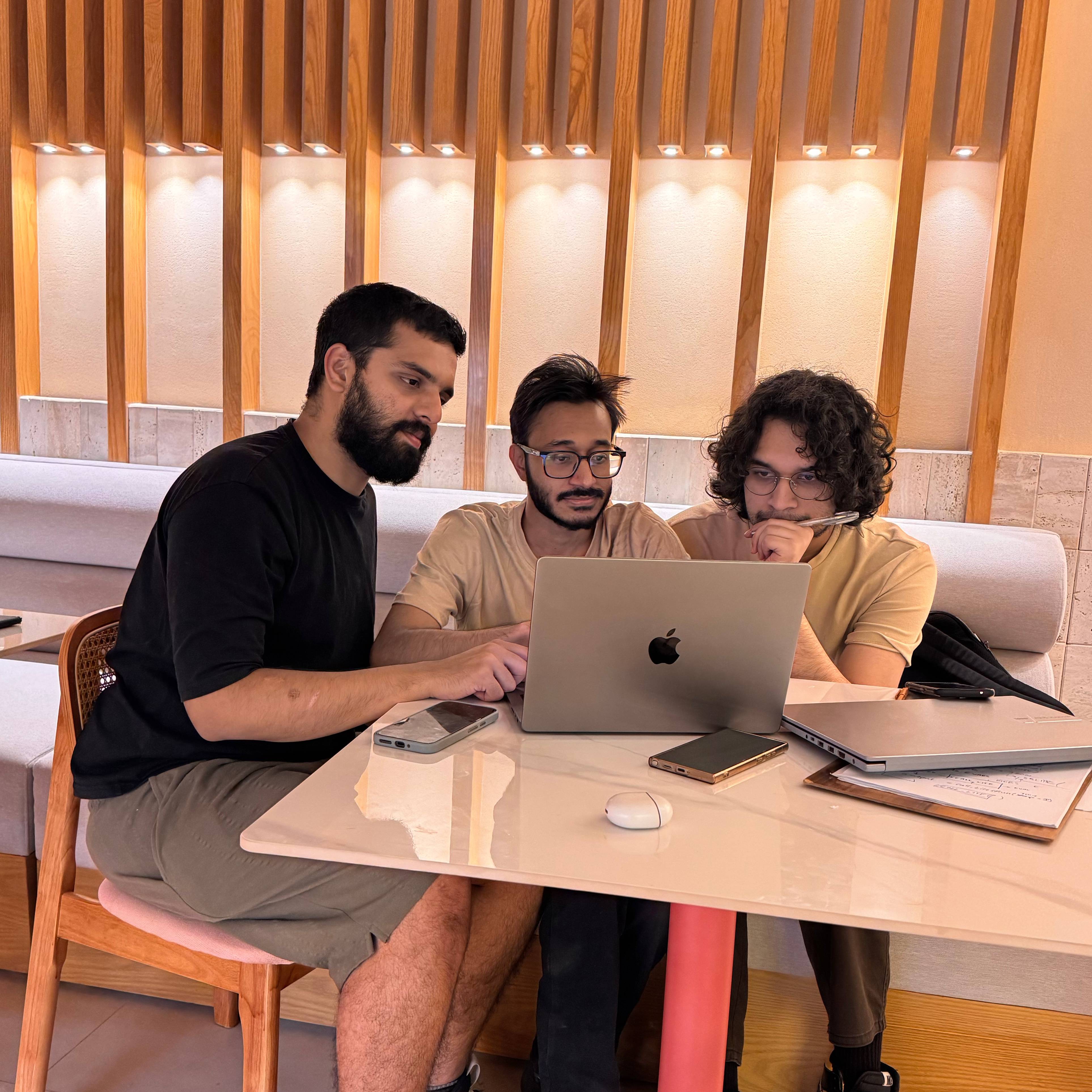 A small team meeting showing workplace trust, collaboration, and open communication